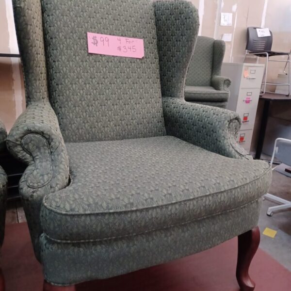 Used traditional wing back guest chair mahogany with green fabric