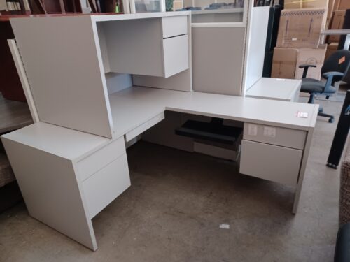 Used 30 x 60- 20 x 45 L desk with 2-box-file pedestals light gray